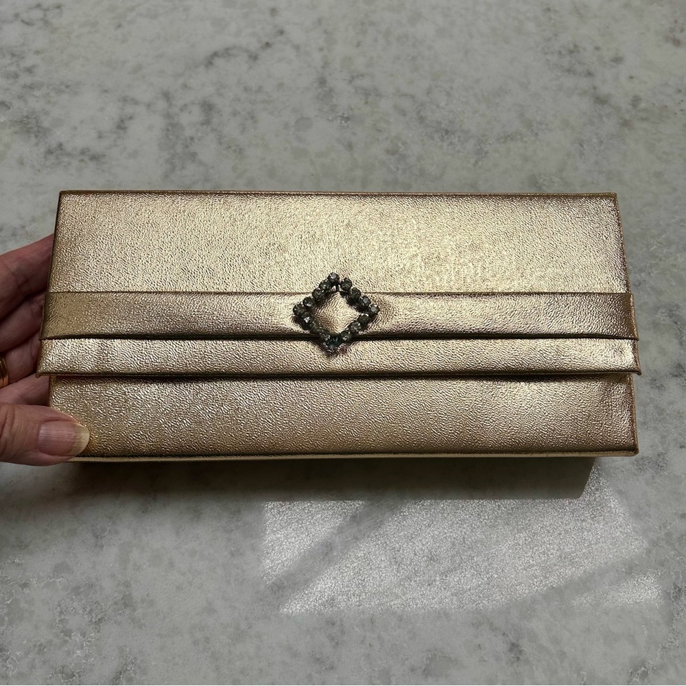 Gold Shimmer Clutch with Ornamental Clasp